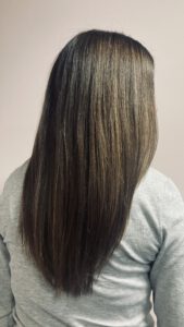 Lang donker haar met warme highlights